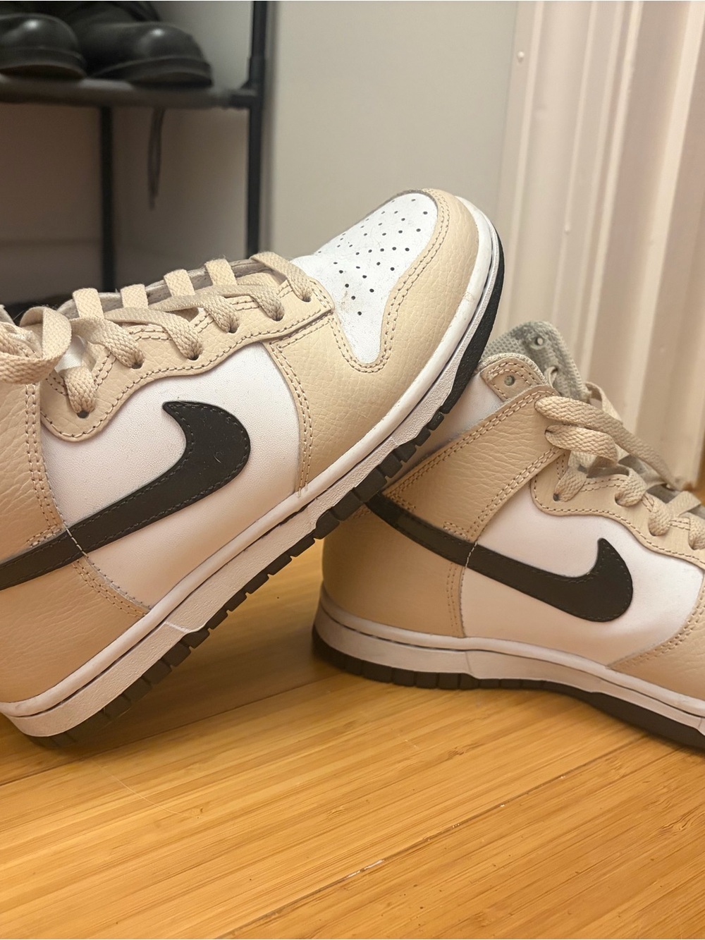 Nike Low-Top Sneakers in Beige, White and Black Swoosh